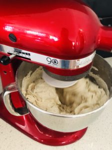 Using an electric mixer to mix the dough makes it a lot quicker. Ive used my kitchenmaid for the authentic Italian Pizza dough.