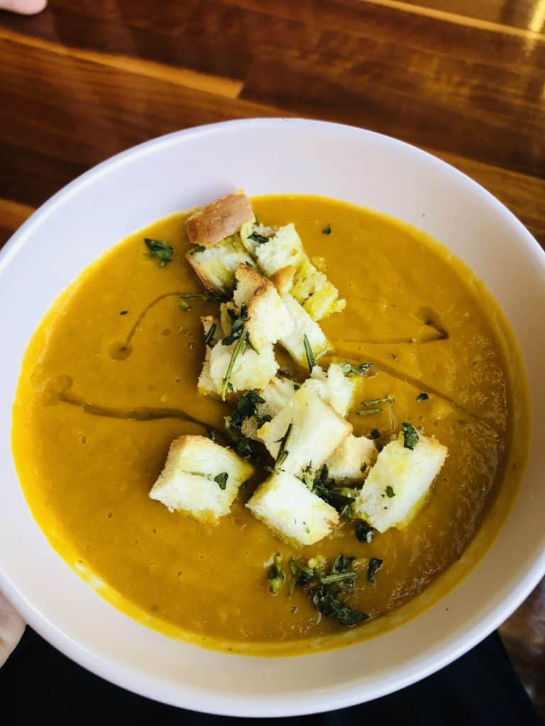 Creamy pumpkin soup with crunchy garlic and thyme croutons