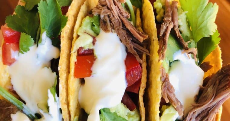 Slow cooker shredded beef tacos