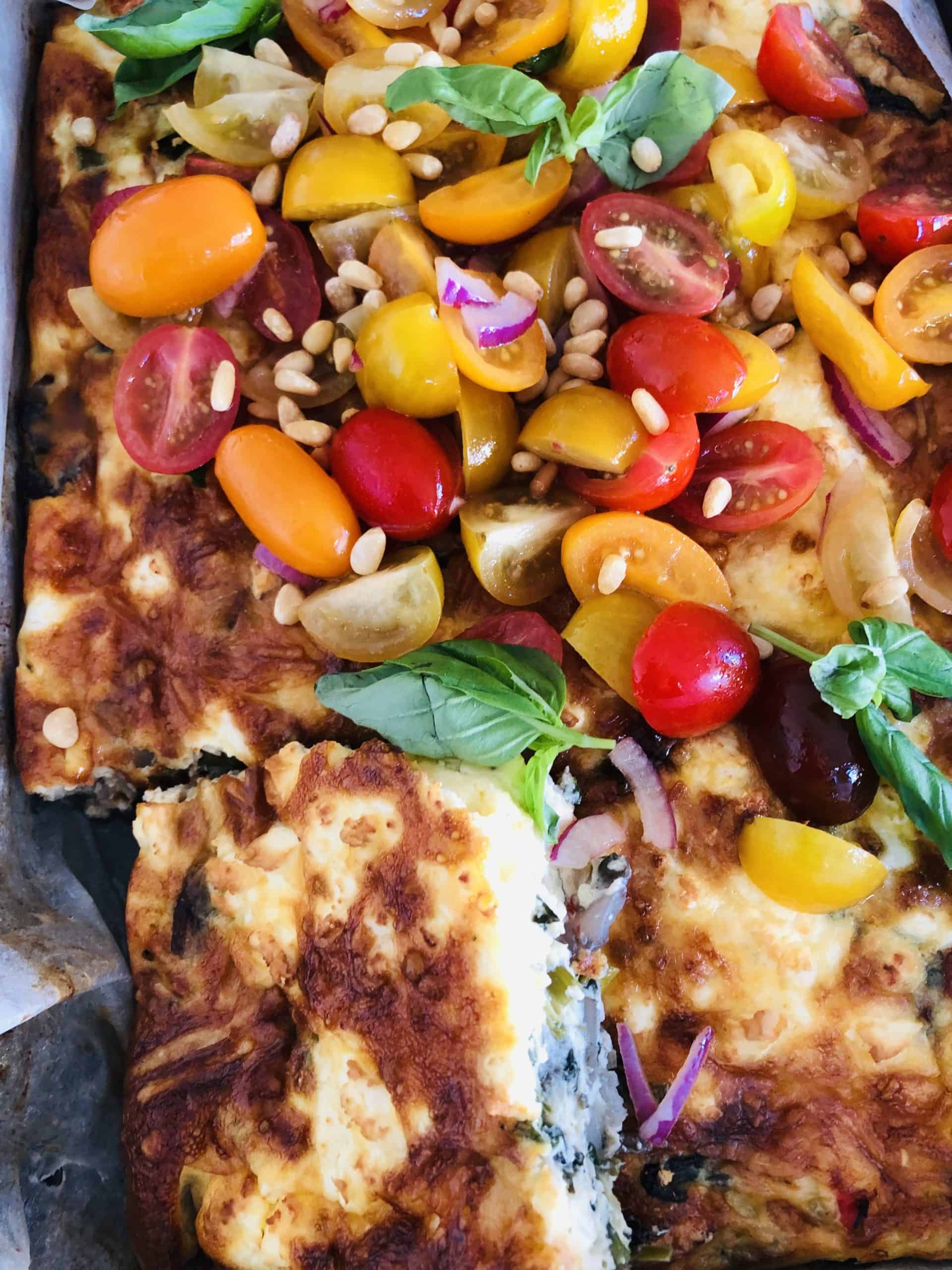 Healthy Vegetable frittata with fresh tomato salad.