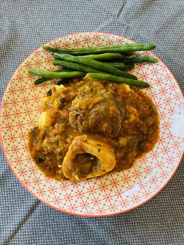 Delicious osso buco with green beans 