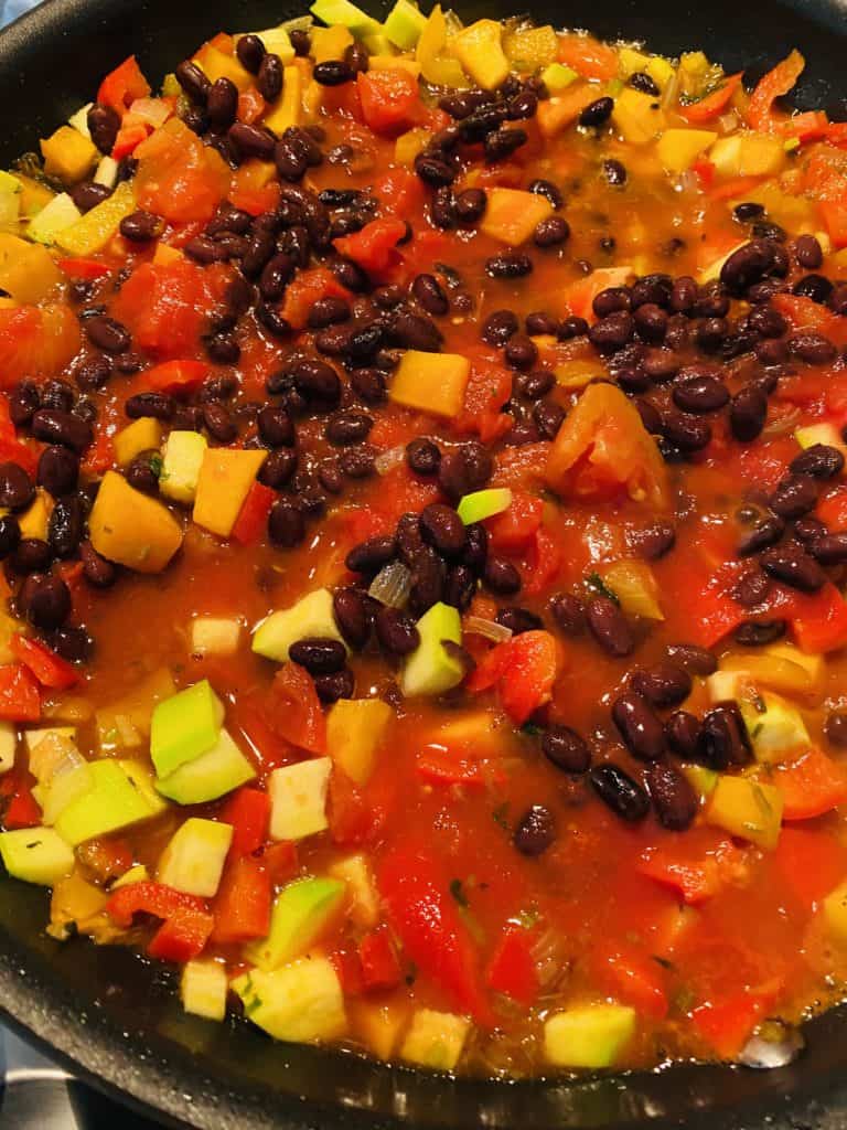 Making the filling for veggie enchiladas